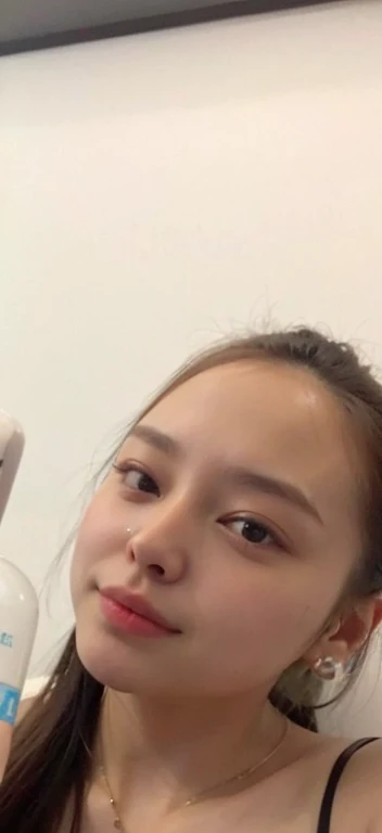 there is a woman holding a bottle of lotion and a toothbrush, 18 years old, selfie of a young woman, iphone selfie, 21 years old, 2 2 years old, 30 years old woman, selfie photo, 3 0 years old woman, 1 8 yo, 2 3 years old, 1 6 years old, wide forehead, without makeup, sexy face