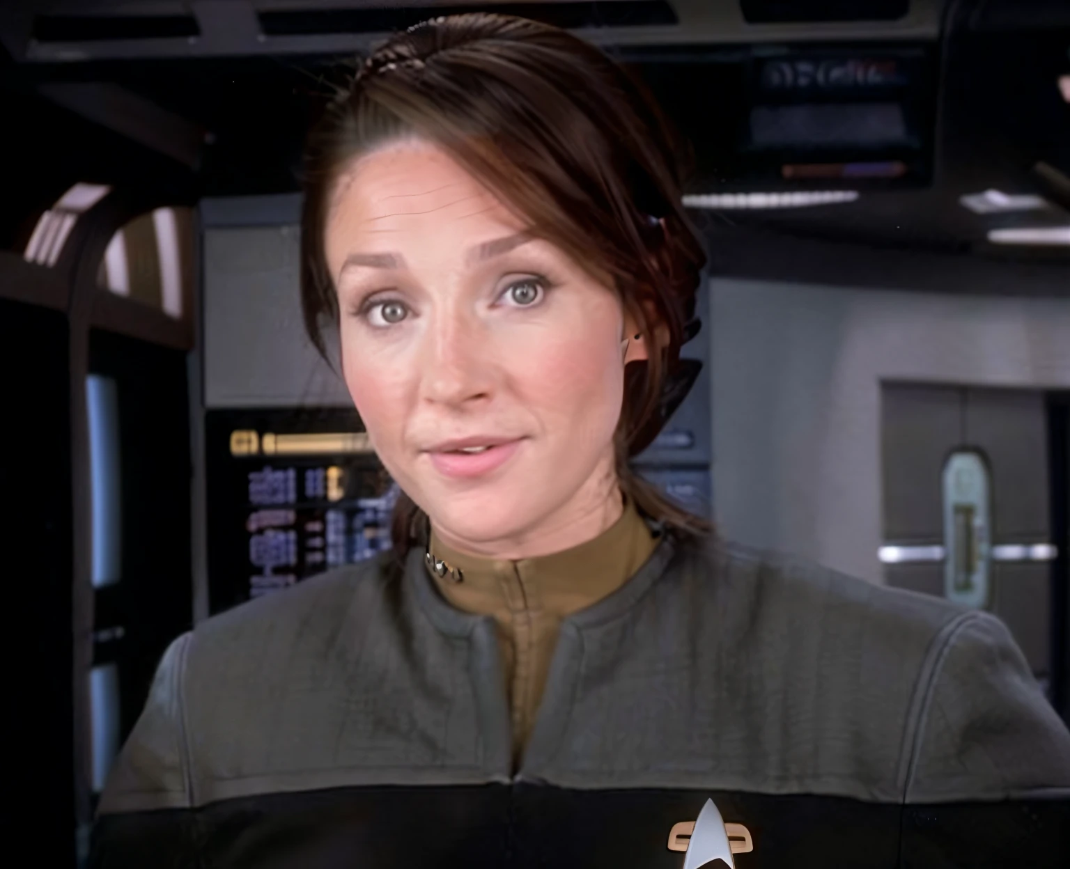 Adult white woman with chestnut brown hair in a ponytail wearing a ds9st uniform, looking at the camera, futuristic starship crew member, deep brown eyes, simple makeup, photorealistic accurate detailed face, face enhanced, background interior of starship, highly detailed vfx portrait of realistic restored face, face picture, attractive sci - fi face, highly detailed vfx portrait, face accuracy