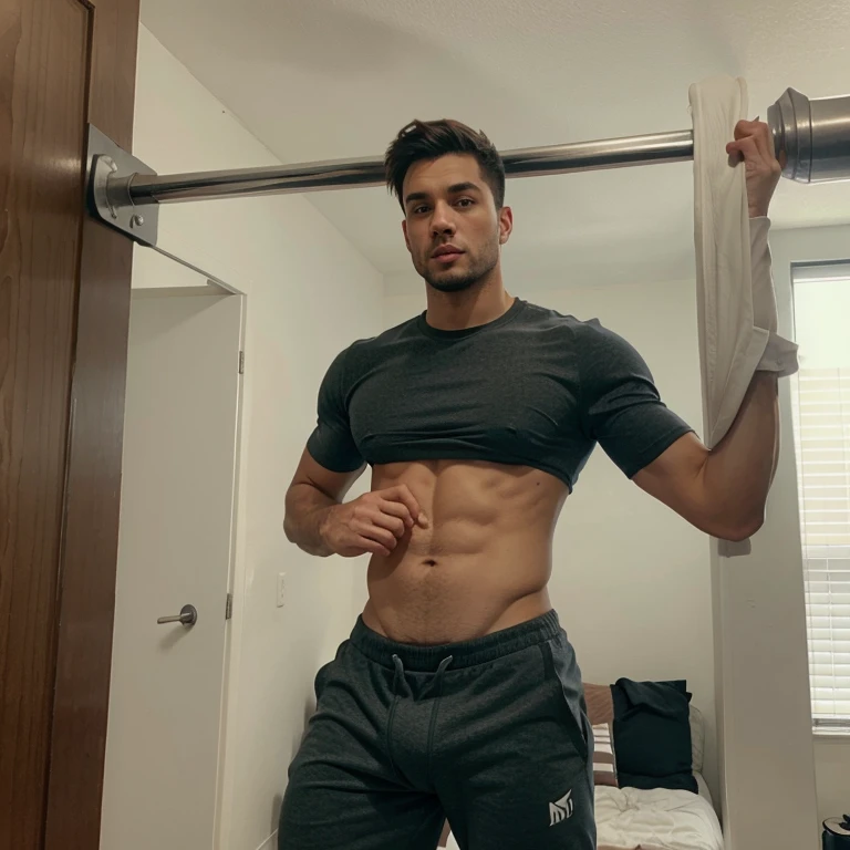 Athletic guy in sweatpants with visible penis line
