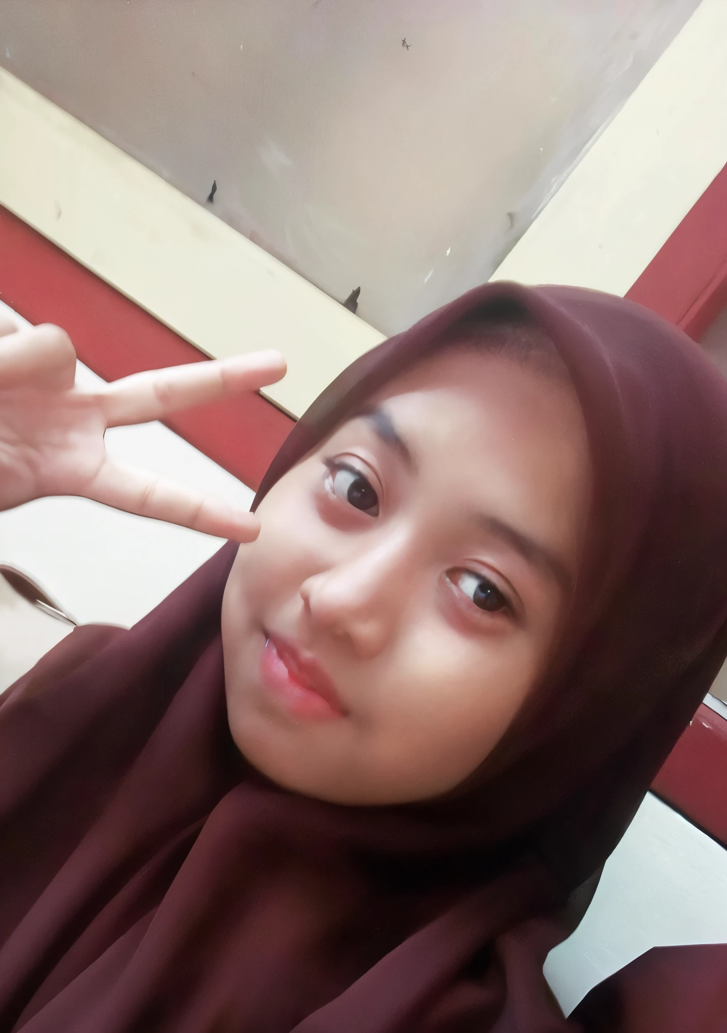 there a woman wearing a hijab posing for a picture, with kind face, friedly smile, real ungine, old picture, student, inspired by Naza, with accurate face, comming, picture, perfect expression, innocent smile, 18 years old, faridah malik, a picture, low quality, peacefull, inspired by Shaddy Safadi