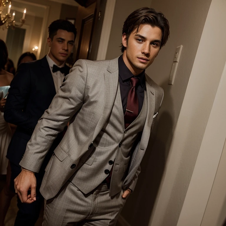 A hot guy at a party in a fancy suit