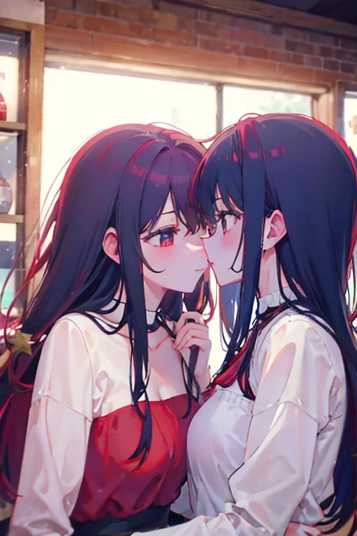 A red haired woman is kissing a black haired woman underneath a mistletoe at christmas party.