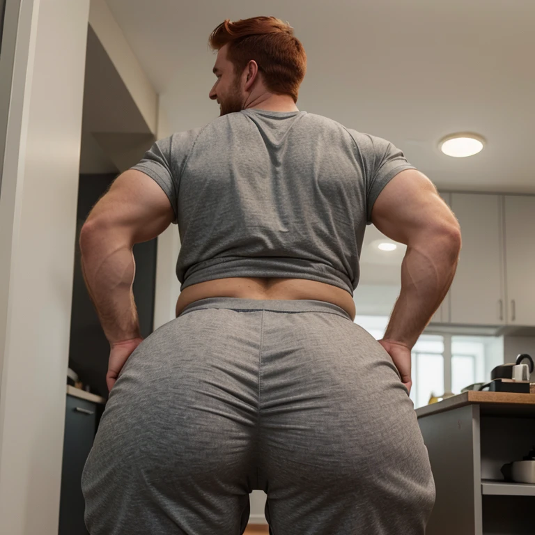 Male, redhead, shirtless, fat ass, grey sweatpants, tight pants, muscular ass, huge butt, comically large butt, big butt, fat man booty, man, short hair, looking back at camera, smiling, big fat booty, bubble butt, big man butt, male bubble butt