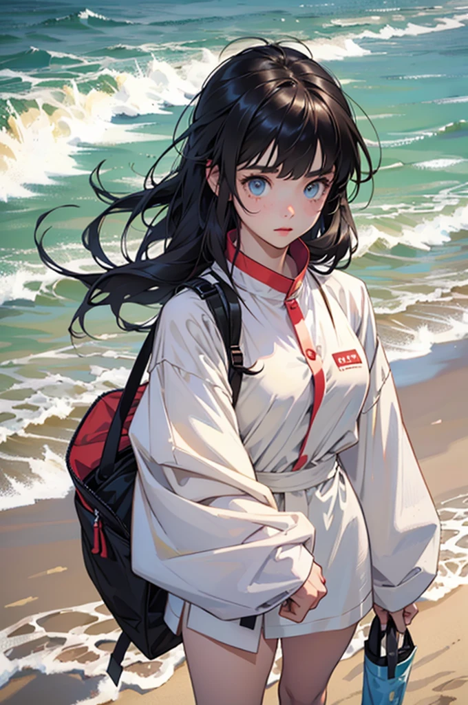 Beautiful young girl with oversized clothes and floating hair on the beach,