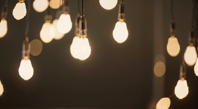 a detail shot of a softly lit, abstract bokeh pattern, showcasing the delicate and sparkling lights as a soft and magical background.