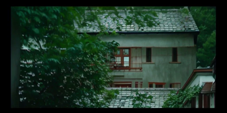 There  a small window in the middle of the building, stills from movies, 35mm —w 1920 —h 1080, Still from live-action movies, Leica 8k stills from a24 film, screenshots from movies, 50mm cine lens, award winning movie still, beautiful cinematography, 4k movie stills