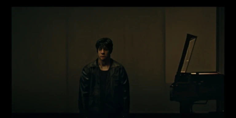 A man standing in a dark room with the lights on, taken from a movie, screenshots from movies, stills from movies, movie frame still, Still from live-action movies, filmed in movies, Still in the movie, Still from music videos, movie lens ar 9:16-n 6-g, screenshots from movies, Still in the movie