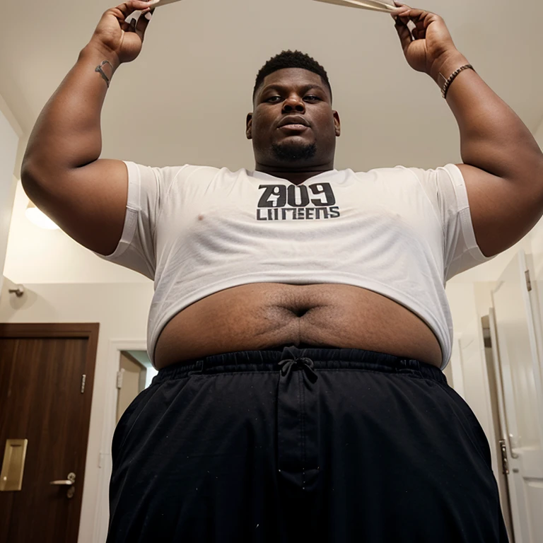 Extremely & visibly Fat 950+ pound Zion Williamson with his belly hanging out of his clothes and is visible.