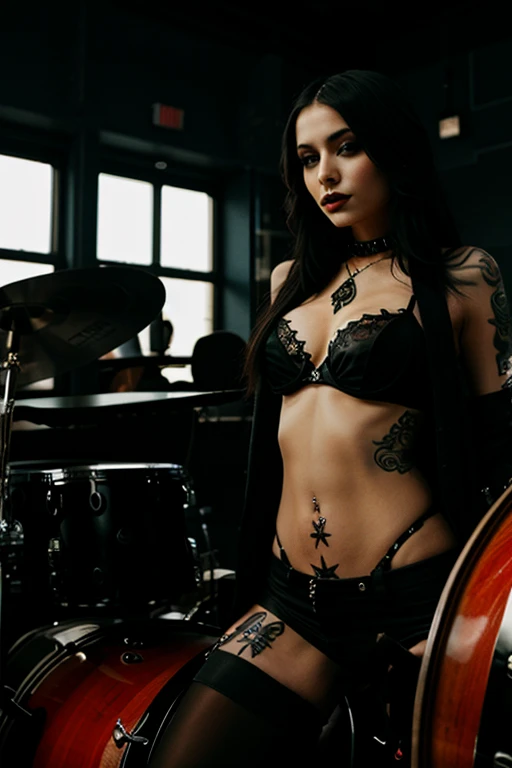 Beautiful sexy gothic girl, with a lot of tattoo on drum set