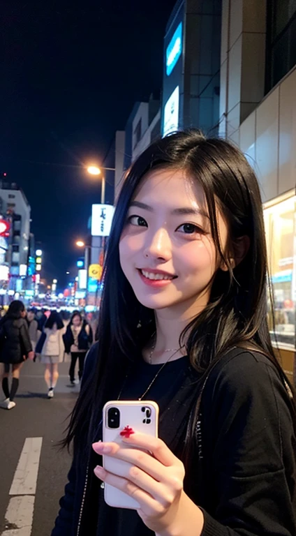 asian girl with black hair taking a selfie in tokio on the streets in the middle of people an lights from buildings with some friends