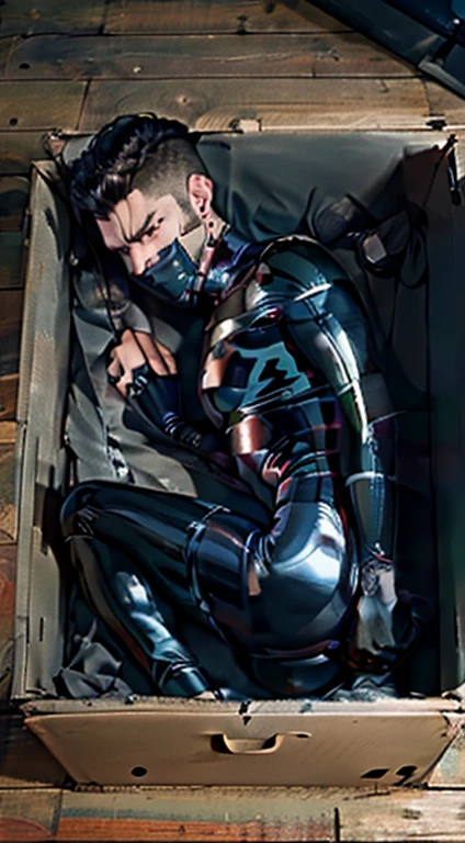 Male in latex bodysuit with tape mouth gag , tight ass, fetal position in box