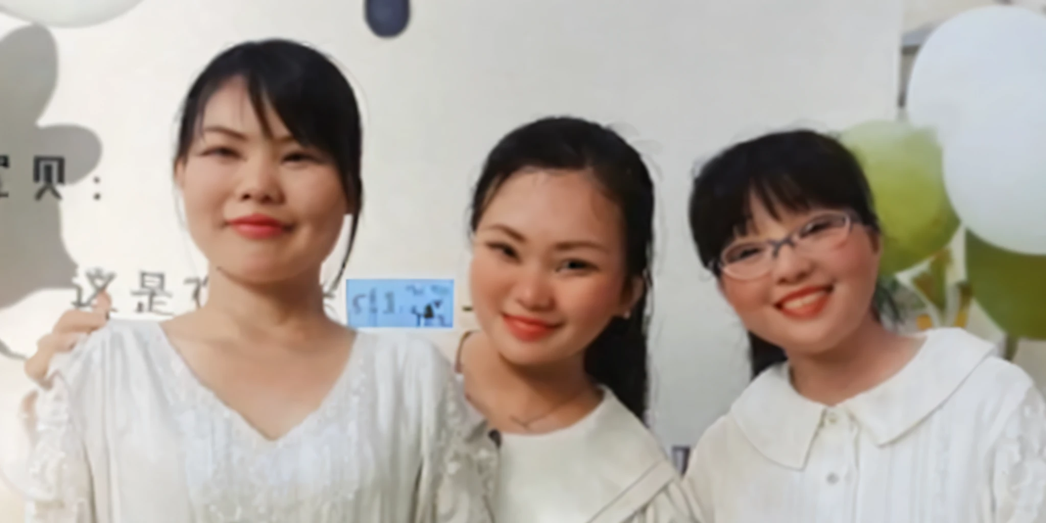 Three girls taking pictures together