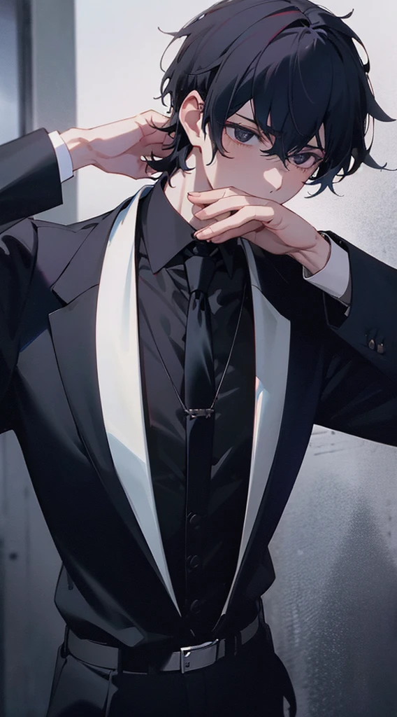 Boy. Black hair. Black eyes. Black suit. Black neck tie. White necklace