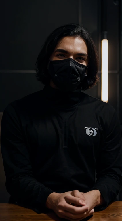 A man sitting in a dark room, wearing full face vendetta mask, and black coloured clothes, hands on table, explaining financial independence to viewers