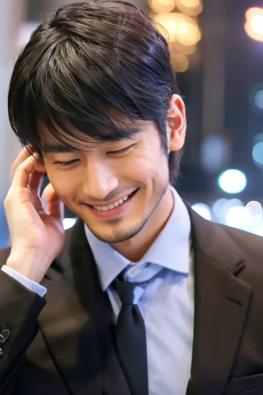 Smiling man looking at smartphone,Handsome Japanese 30 year old man,I have a smartphone,wears a suit,Hands on the face