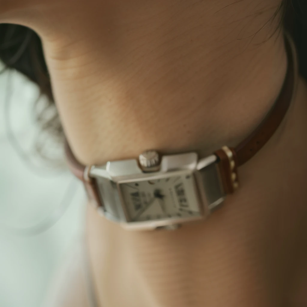 RAW photo, Silver wristwatch, Leather strap, Maximum similarity, 8K UHD, higly detailed, hiquality