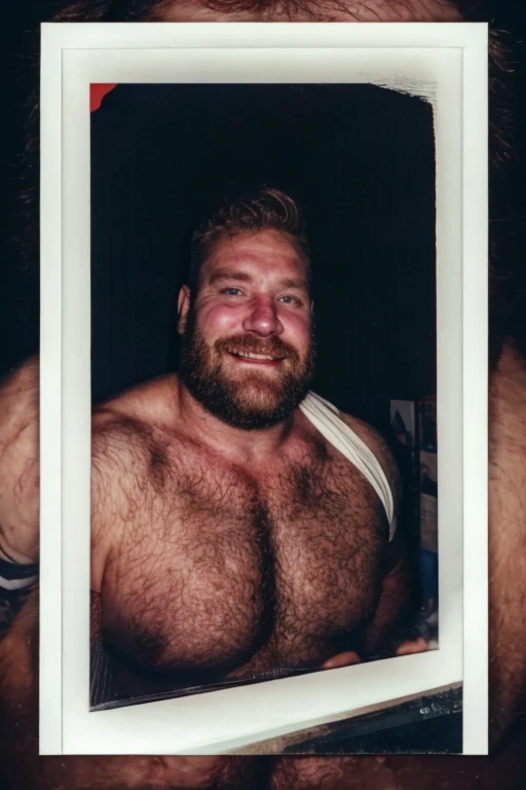 a beefy guy, dad, 1950s, shirtless, detailed pupils, macho, hairy, homoerotic, polaroid image, old, distorted, scratched, ray tracing, chromatic aberration abuse, motion lines, atmospheric perspective, cowboy shot, UHD, textured skin, 4K