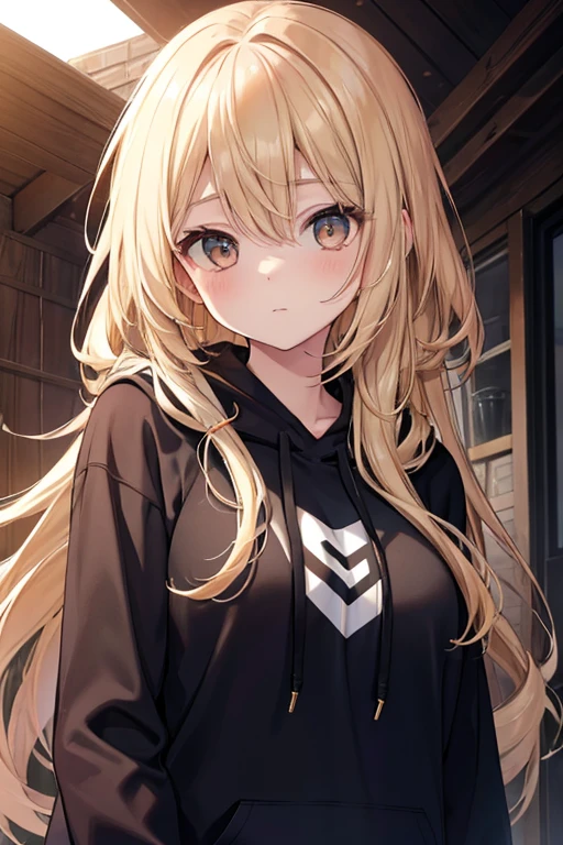 A Beautiful Young Woman with sun dappled skin Dirty Blonde hair and Deep Brown eyes wearing a black hoodie