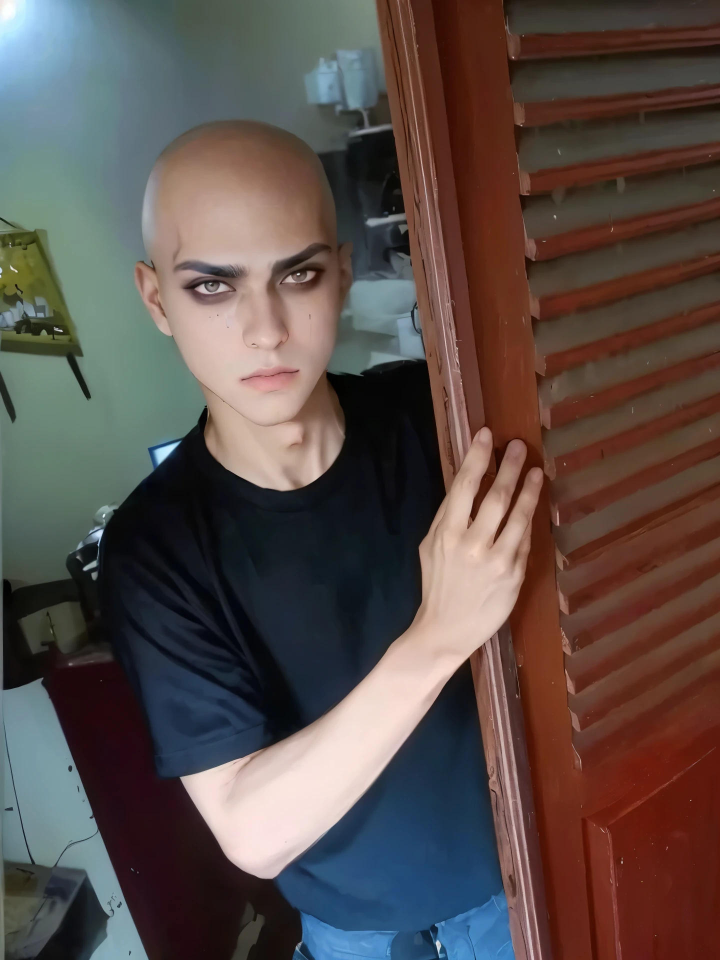 arafed man with bald head and black eye make up peeking out of a door, scary look, 1 7 - year - old boy thin face, with black sclera eyes, shaven face, emaciated shaved face, black eyes and large forehead, shaved face, heavy make up, showing forehead, heavy makeup, shaved head, buzzed hair on temple