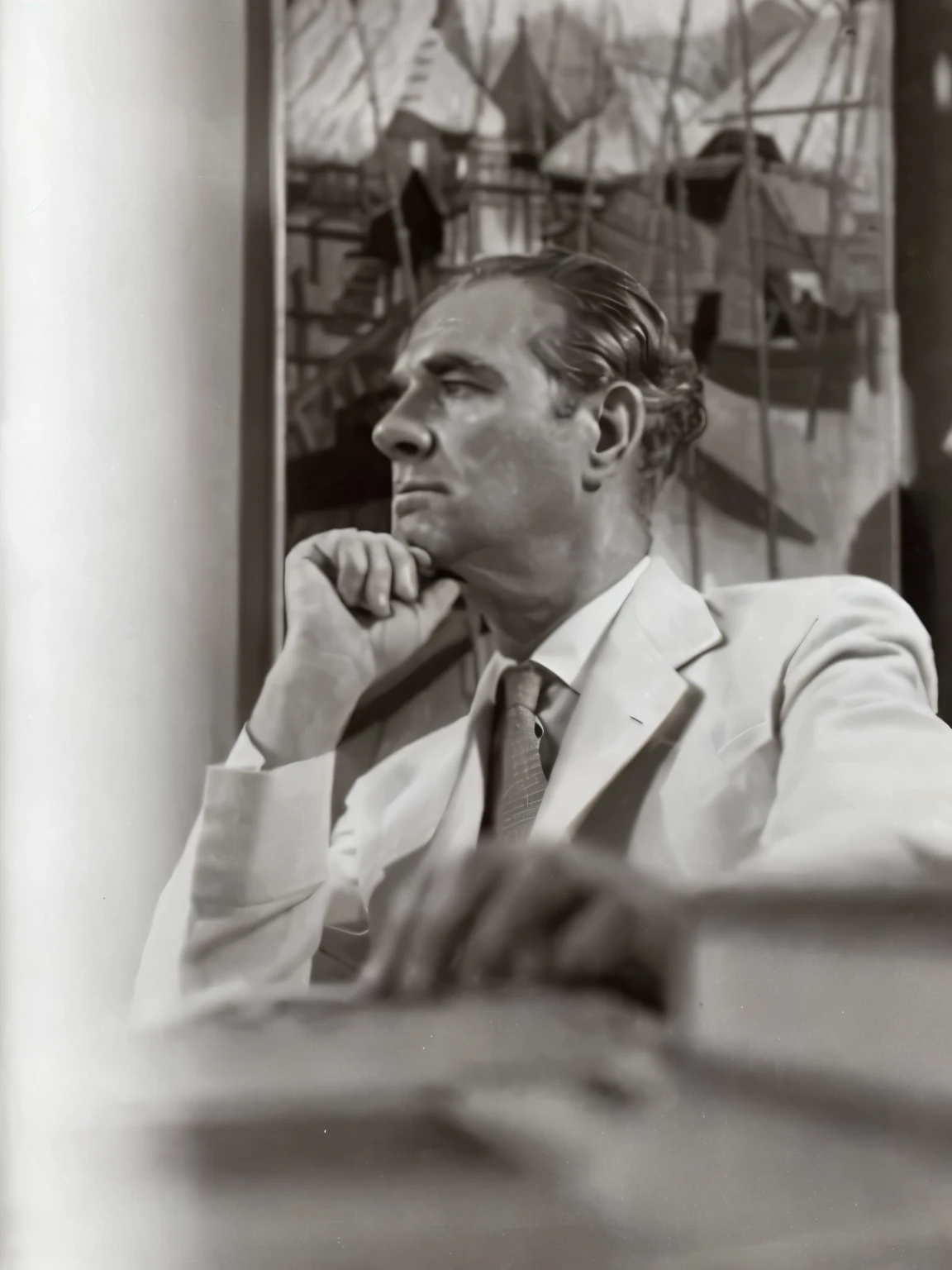 Aarav man in a suit sits at a table with a book.., Ivan Chermayev, Careltol, Alvar Aalto, Niels Otto Moller, By Robert Colquhoun, Architect Lebus Woods, Jean Girard, Walter Gropius, Zdzislaw Bekinski, Giorgio di Chirico