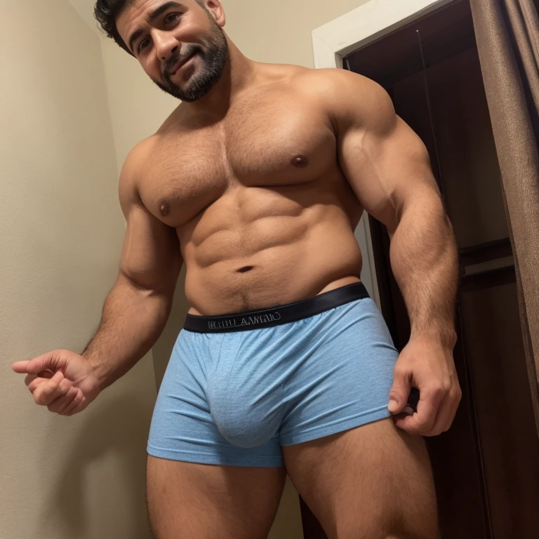 Handsome Latin man 40 years old, in tight boxers, con un bulto muy grande en la entrepierna, se tiene que ver la cara.