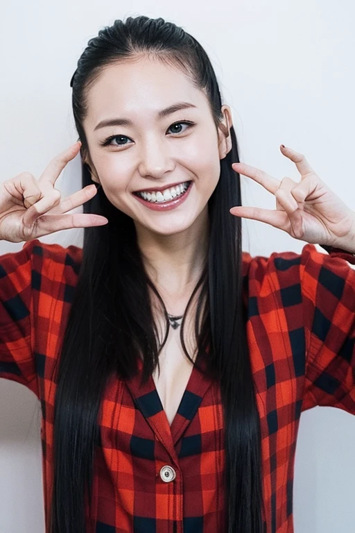 Japanese woman smiling while making psychopathic look