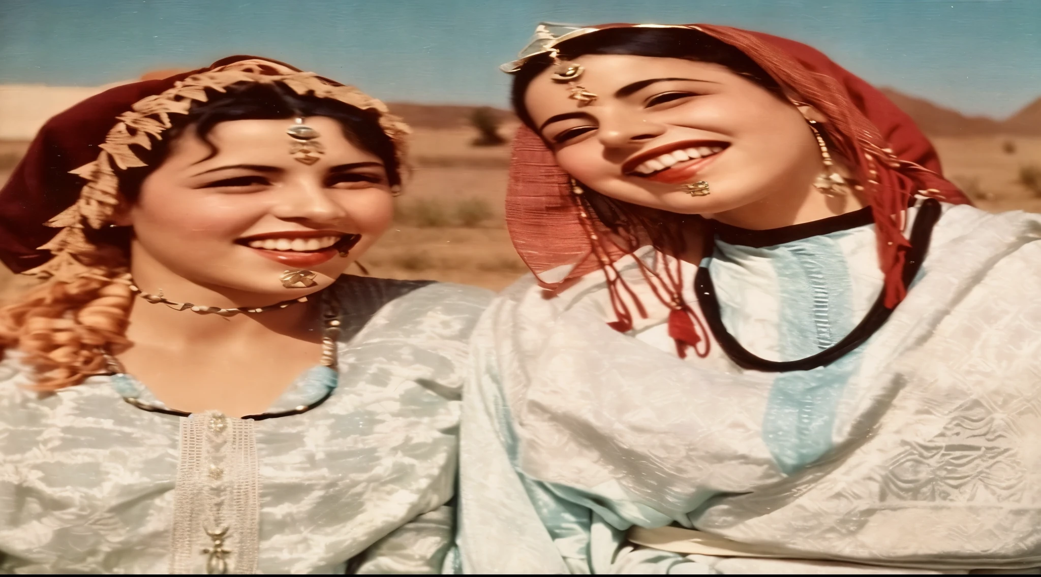 two women in traditional clothing smile and pose for a picture, 1960s orientalism, moroccan queens ny, arab young monica belluci, 1 9 5 0, 1950, 1959, 1 9 5 8, 1958, traditional clothes, historical image, 1 9 5 6, 1956 Amazigh Amazigh outfit