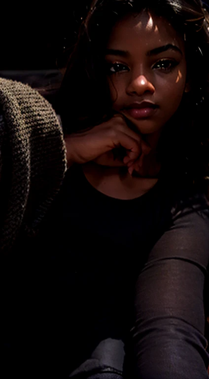 ((African girl)) in sweat pants and tank top, sitting with knee up