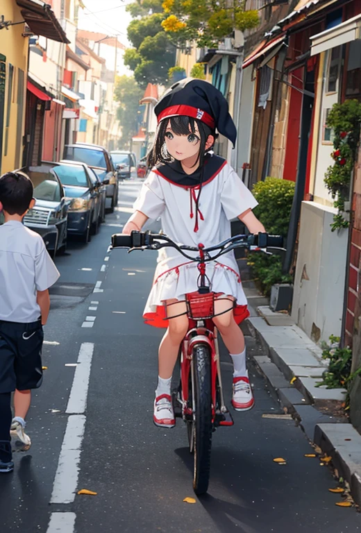 Um ciclista vestido de papai Noel, is on a tree-filled street with wide sidewalks, passeios largos