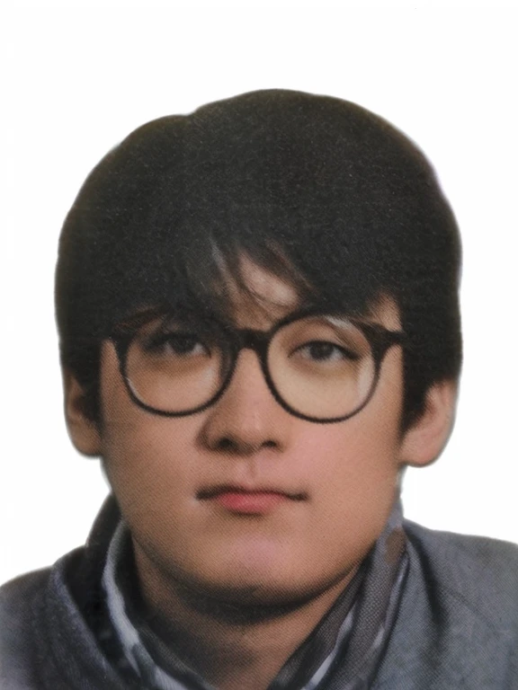 Japan around 1984、Ivy Fashion-loving college student、In a model-like pose wearing a sweater and chino pants.、Standing on the university campus