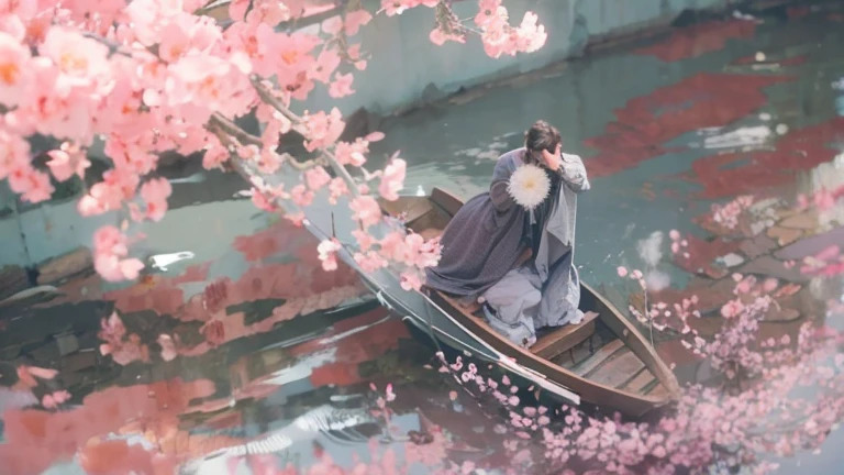 complete ancient style ,man,There are flowers on the water,There is a shore