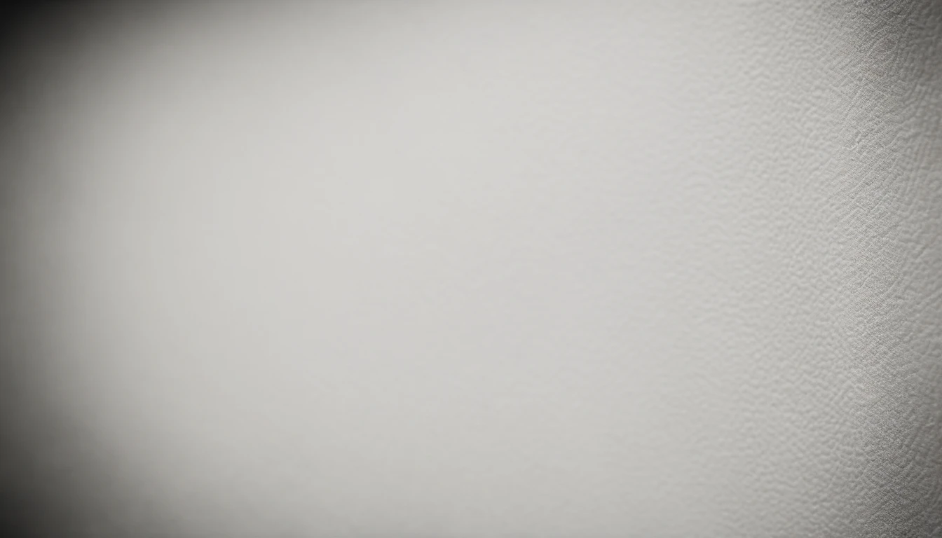 a detailed macro shot of the texture of an empty white wall, focusing on the fine grain and subtle imperfections that give it character and depth