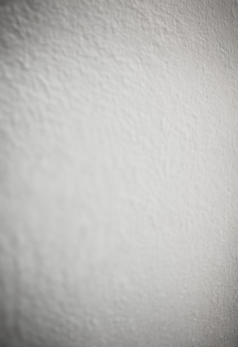 a detailed macro shot of the texture of an empty white wall, focusing on the fine grain and subtle imperfections that give it character and depth