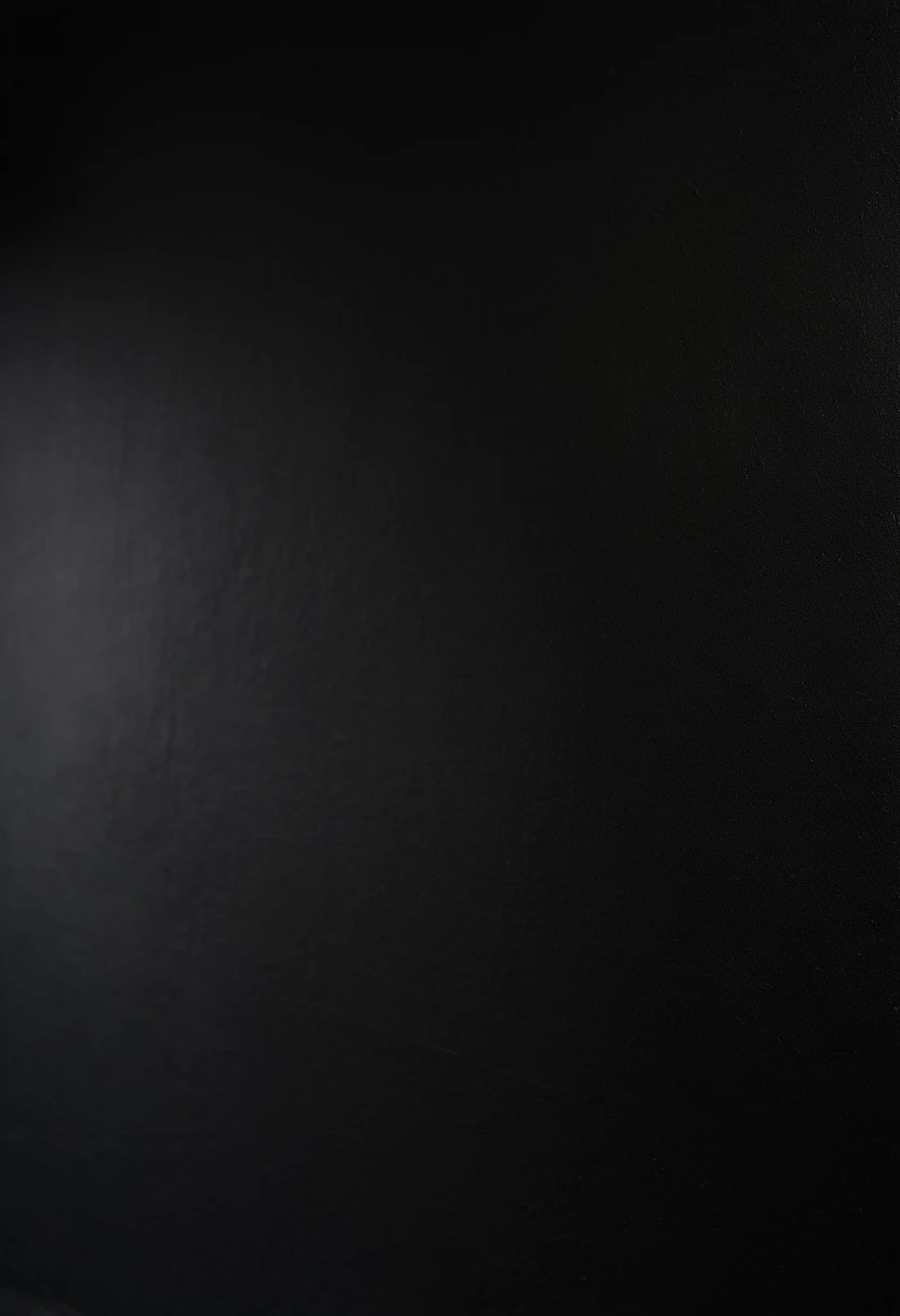 a detailed macro shot of the texture of an empty black wall, focusing on the fine grain and subtle imperfections that give it character and depth