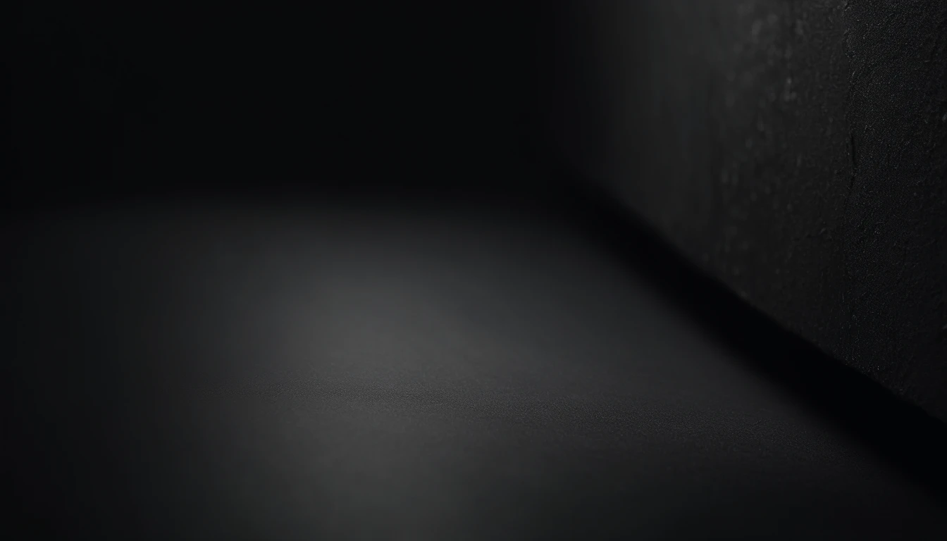 a detailed macro shot of the texture of an empty black wall, focusing on the fine grain and subtle imperfections that give it character and depth