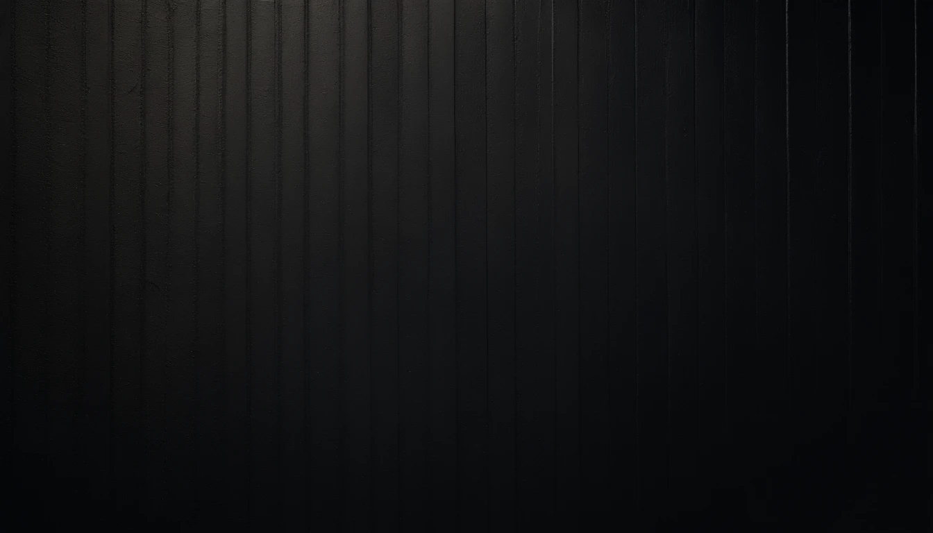 a detailed macro shot of the texture of an empty black wall, focusing on the fine grain and subtle imperfections that give it character and depth