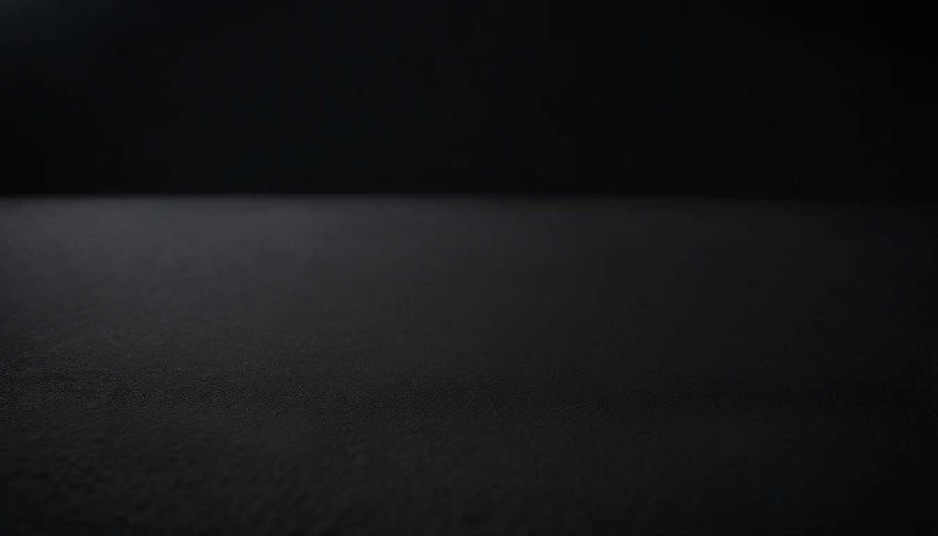 a detailed macro shot of the texture of an empty black wall, focusing on the fine grain and subtle imperfections that give it character and depth