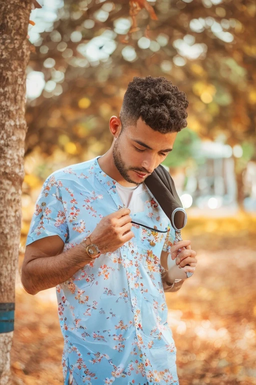 there is a man standing in a park with a tie on his shoulder, mohamed chahin style, riyahd cassiem, mohamed chahin, profile shot, profile pose, casual photography, absolutely outstanding image, caio santos, younale, young male, ismail, potrait, portait photo profile picture, male teenager,  boy, music video,Ultra realistic, high details, good lighting , 8k , best view , good haircut, replace face