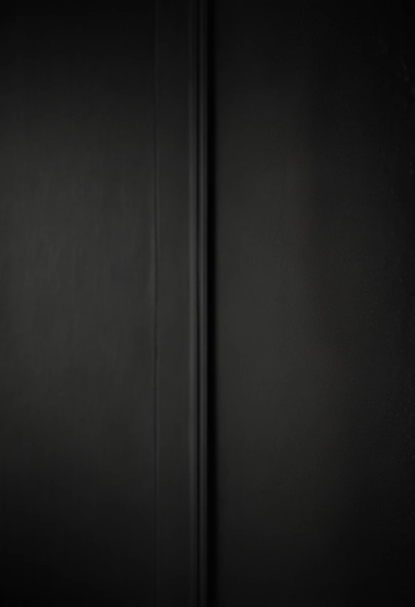 a detailed macro shot of the texture of an empty black wall, focusing on the fine grain and subtle imperfections that give it character and depth