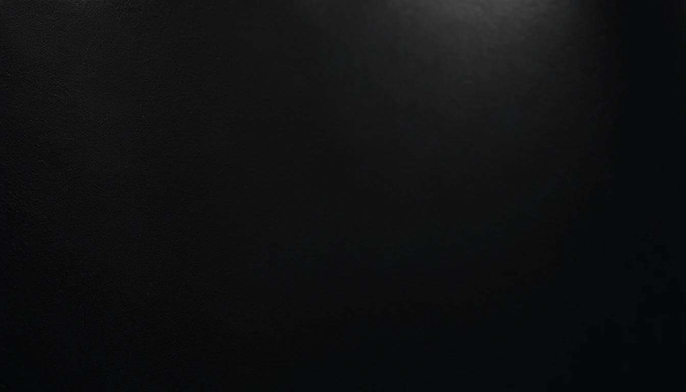 a detailed macro shot of the texture of an empty black wall, focusing on the fine grain and subtle imperfections that give it character and depth