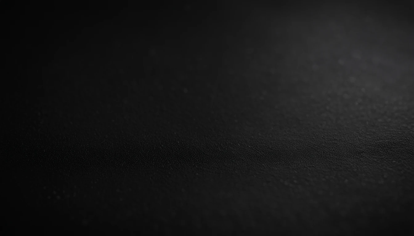a detailed macro shot of the texture of an empty black wall, focusing on the fine grain and subtle imperfections that give it character and depth