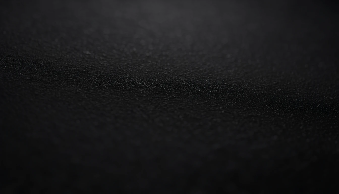 a detailed macro shot of the texture of an empty black wall, focusing on the fine grain and subtle imperfections that give it character and depth