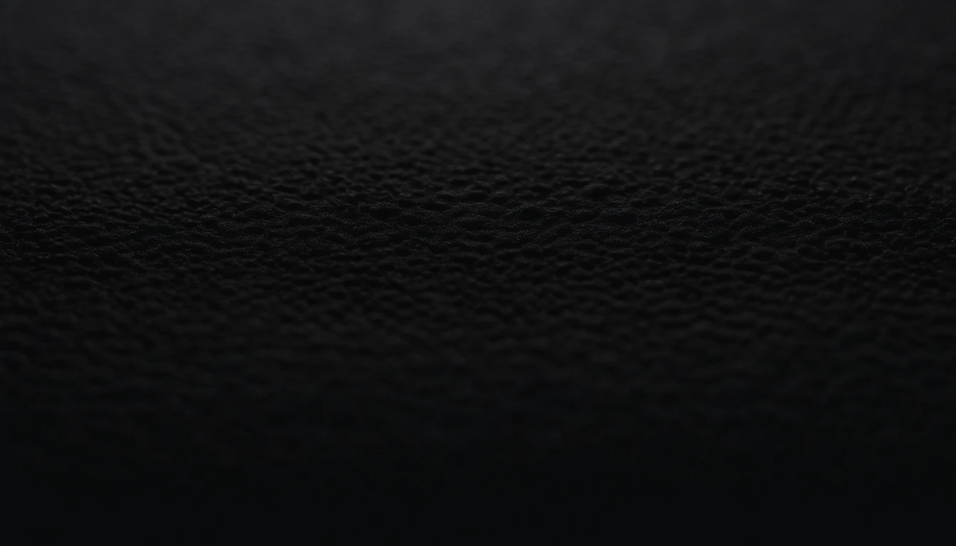 a detailed macro shot of the texture of an empty black wall, focusing on the fine grain and subtle imperfections that give it character and depth