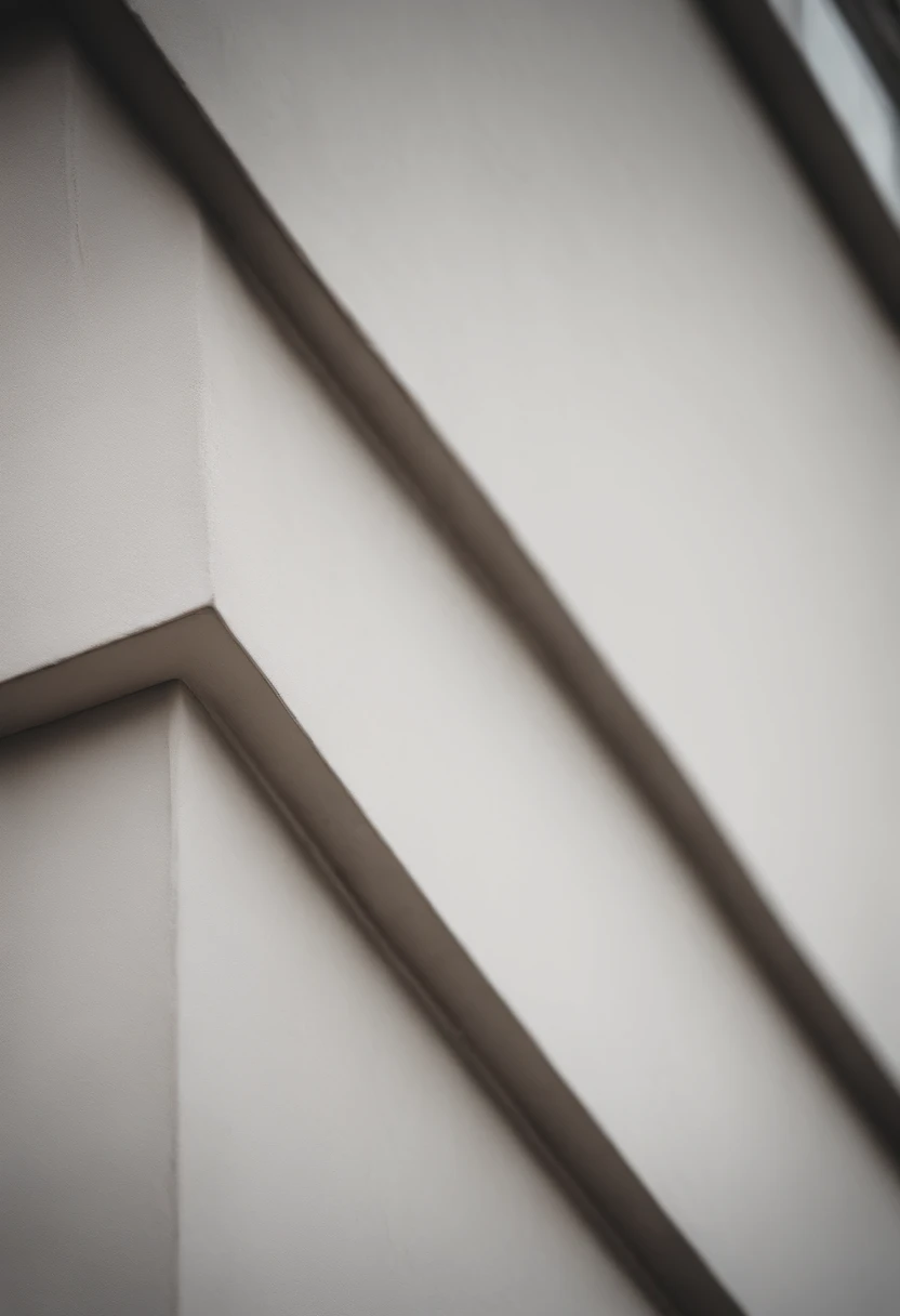 a detailed macro shot of the texture of an empty white wall, focusing on the fine grain and subtle imperfections that give it character and depth