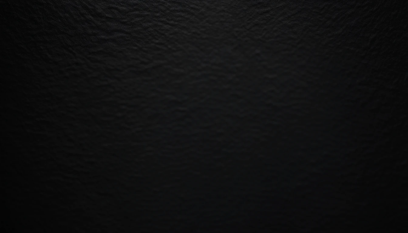 a detailed macro shot of the texture of an empty black wall, focusing on the fine grain and subtle imperfections that give it character and depth
