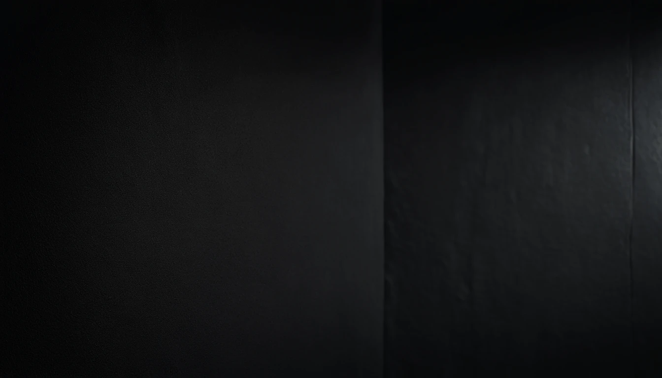 a detailed macro shot of the texture of an empty black wall, focusing on the fine grain and subtle imperfections that give it character and depth