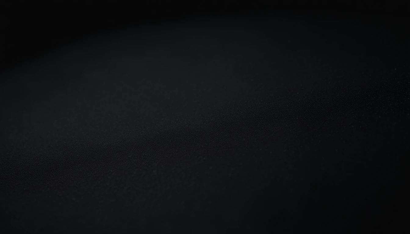 a detailed macro shot of the texture of an empty black wall, focusing on the fine grain and subtle imperfections that give it character and depth