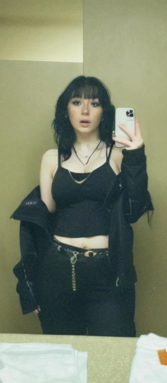 arafed woman taking a selfie in a mirror with a cell phone, with pale skin, she looks like a mix of grimes, goth girl aesthetic, 1 7 - year - old goth girl, looks like a mix of grimes, goth aesthetic, pale goth beauty, looks a blend of grimes, very very very pale white skin, resembling a mix of grimes, Big tits, huge tits, no clothes, sexy, cute, wide hips, thick thighs, pear-shaped body, minimal clothes, thick, bbw, chubby stomach, thick nipples, nipple piercings, large areola, hard nipples, piercing through shirt, nipples hard through shirt, busty, major cleavage, naked, ripping through top, boobs spilling over sides, bra too tight, giant tits, dominatrix, dominatrix clothes, revealing clothes