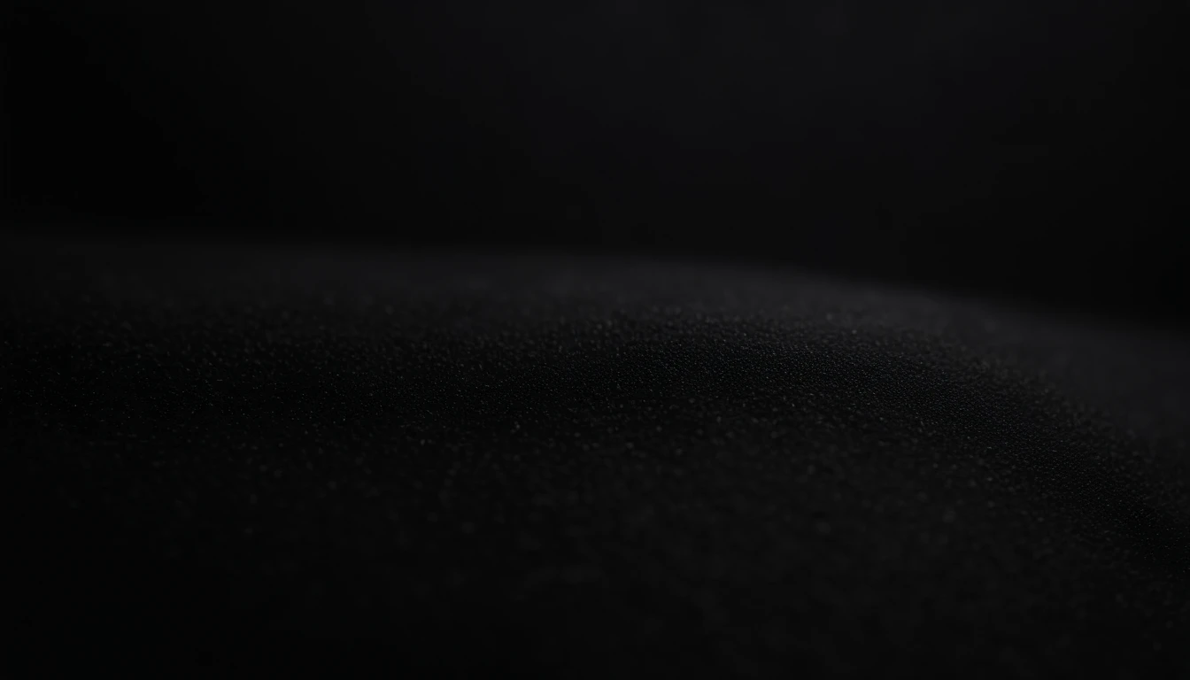 a detailed macro shot of the texture of an empty black wall, focusing on the fine grain and subtle imperfections that give it character and depth