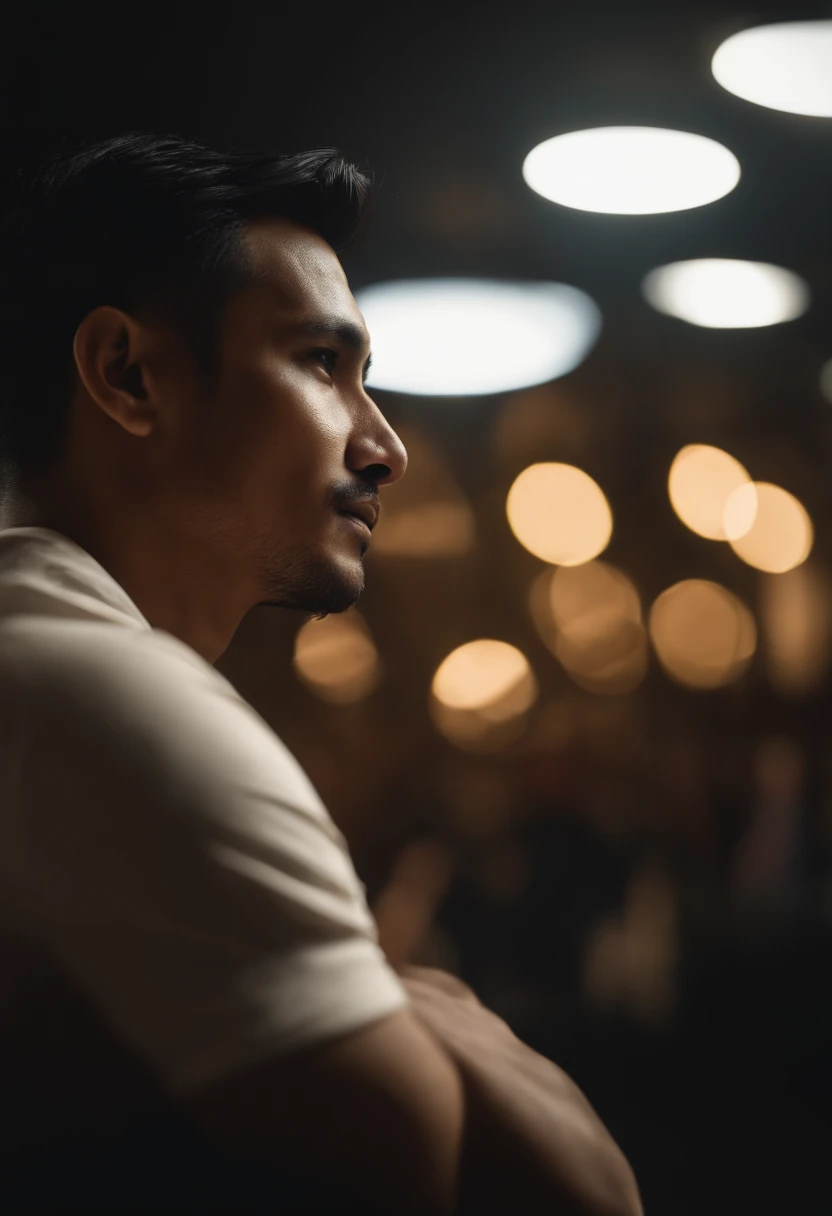 Portrait of a man looking into his future. Age is 31. Shot from side. Malay.